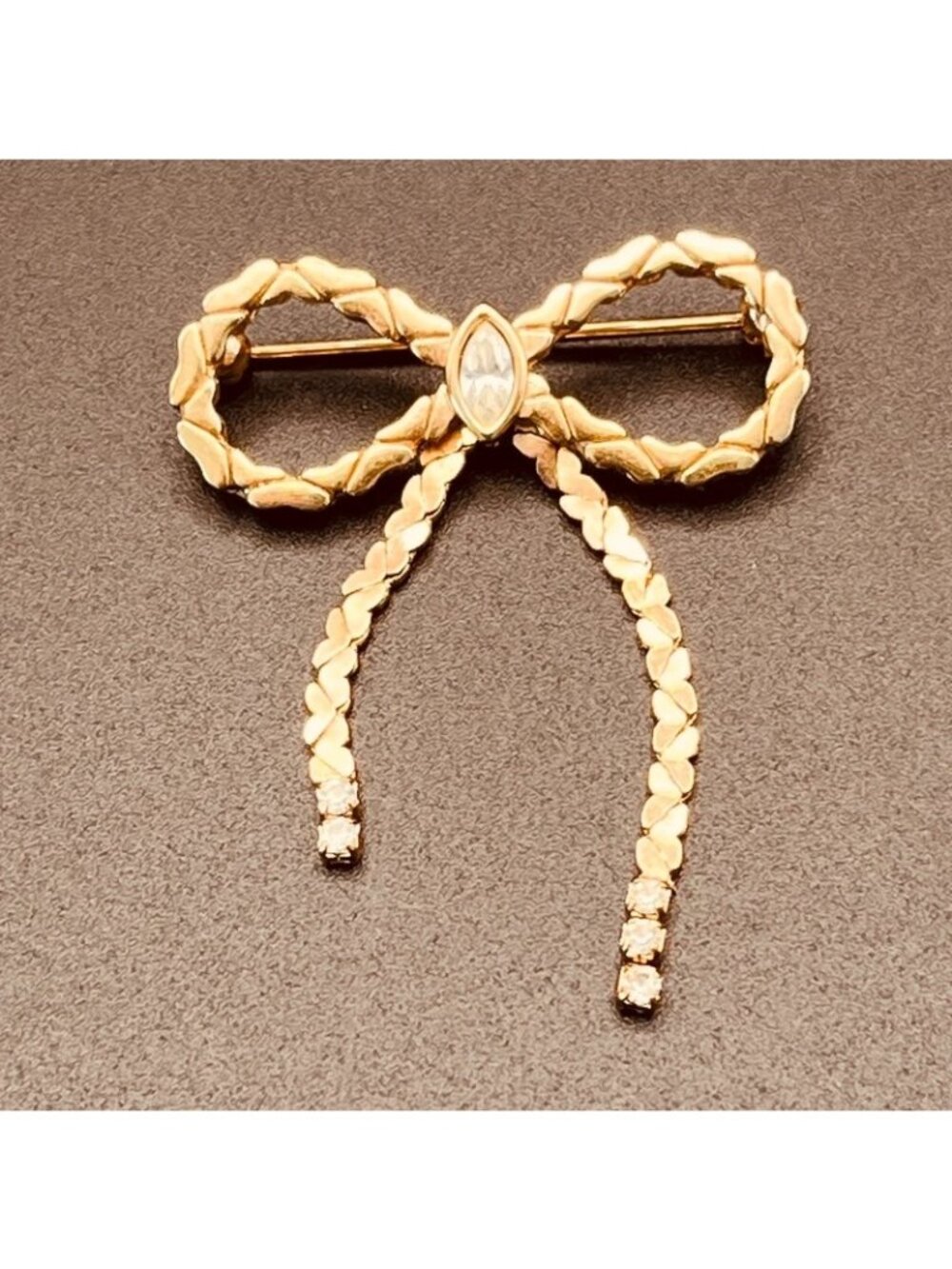Vintage 80s Gold Tone Bow Brooch with Rhinestones